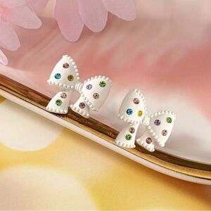 Bow shape stud earrings